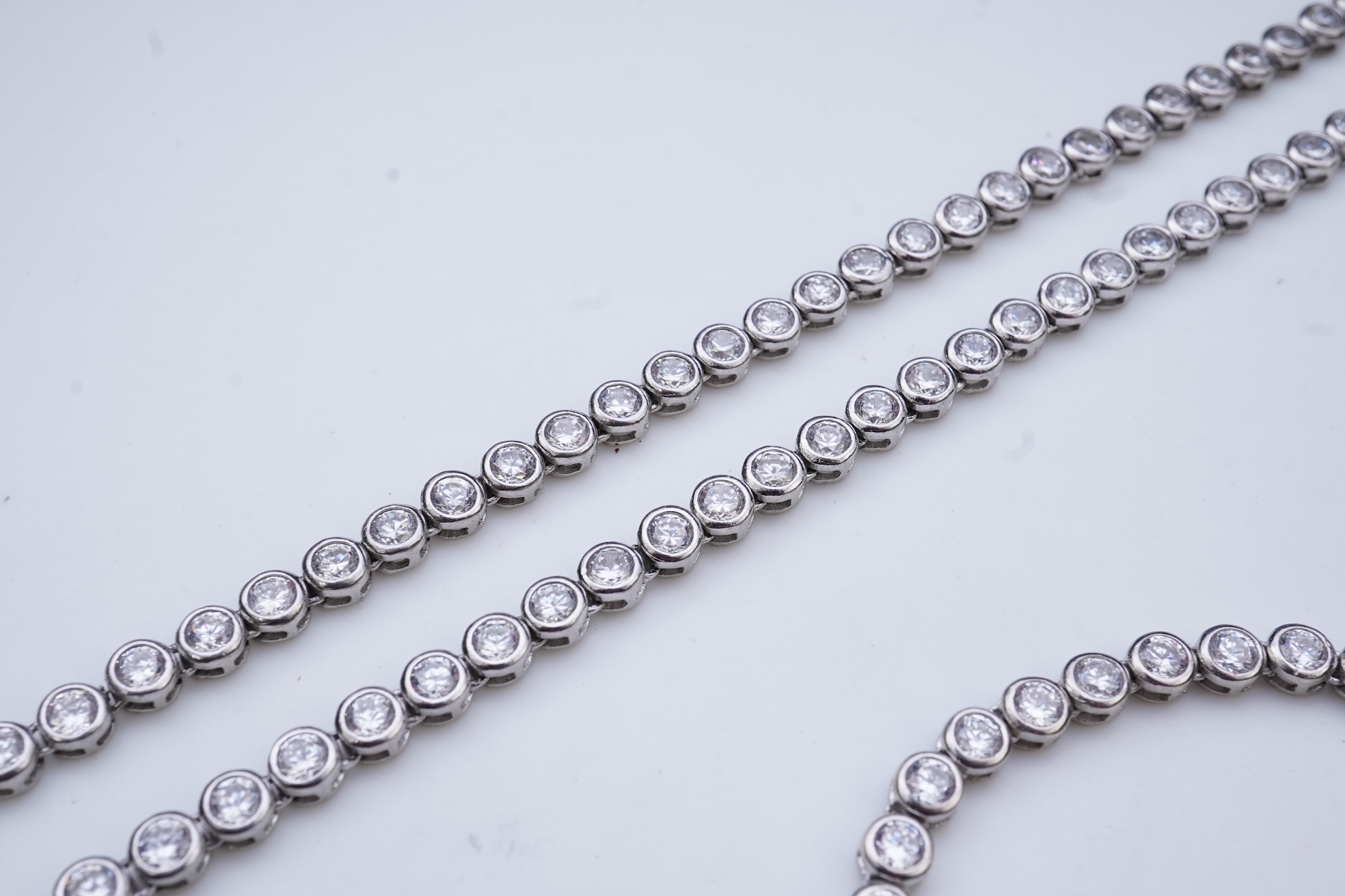 A cubic zirconia demi-parure